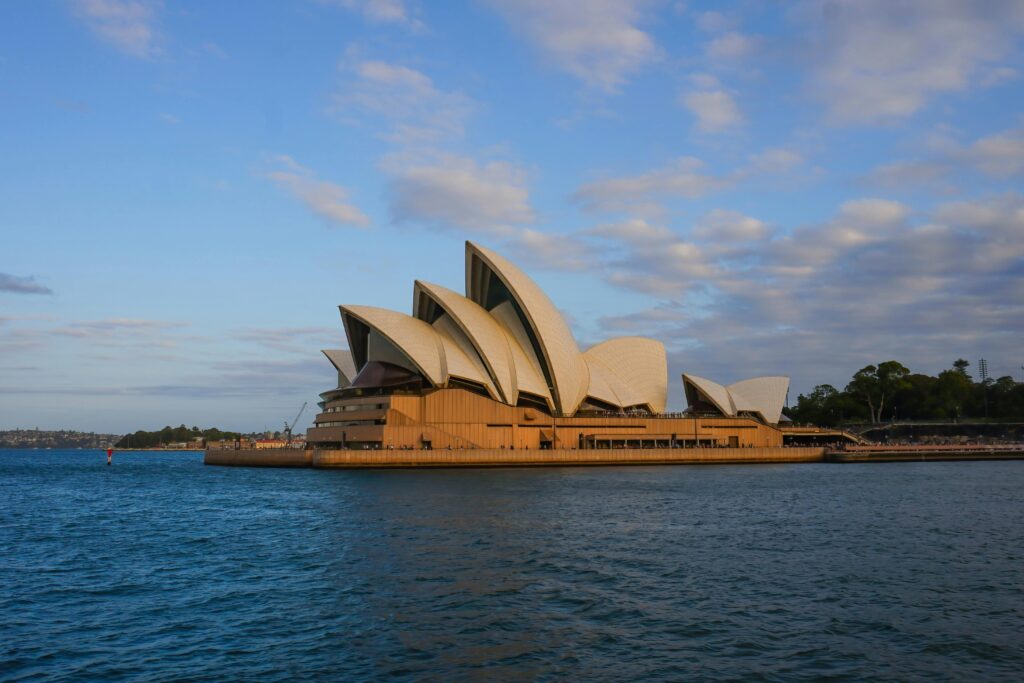 Stunning view of the Sydney Opera House against a beautiful sky in the evening light.